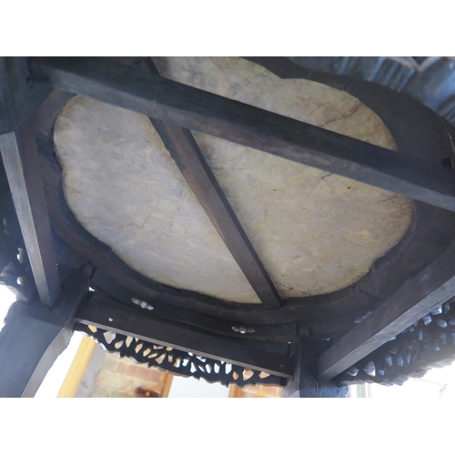 292 - A tall Oriental carved hardwood marble top jardiniere stand with under tier, with good colour and in... 