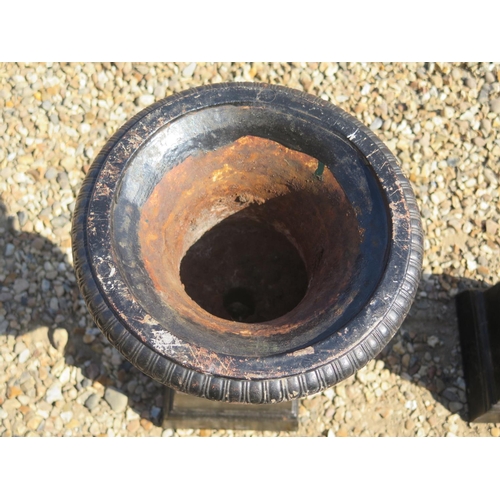 78 - A pair of Victorian cast iron garden urns on stands, approx 51cm H