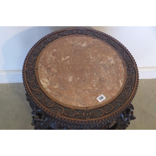 150 - A 19th century early 20th century Chinese carved hardwood jardiniere stand with a marble top, and an... 