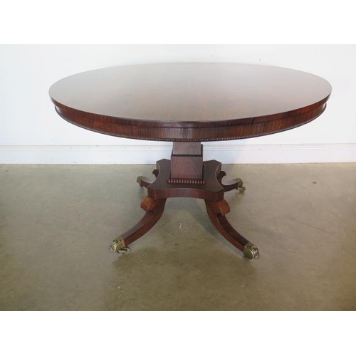 142 - A superb quality Regency rosewood breakfast/centre table, veneered on solid mahogany and supported o... 