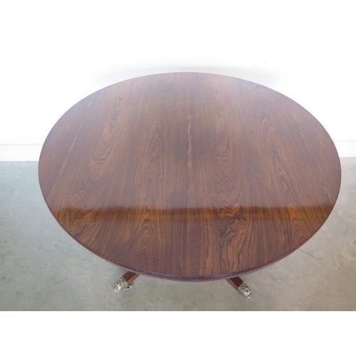 142 - A superb quality Regency rosewood breakfast/centre table, veneered on solid mahogany and supported o... 