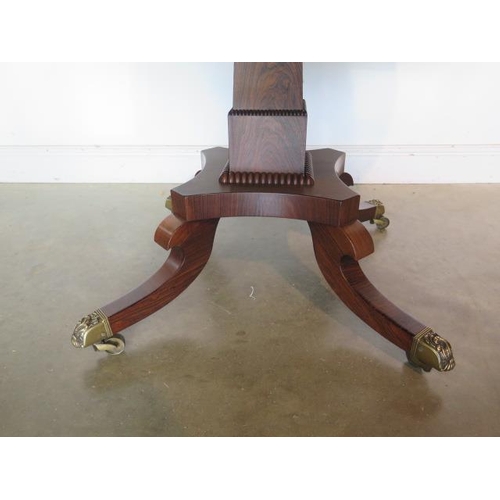 142 - A superb quality Regency rosewood breakfast/centre table, veneered on solid mahogany and supported o... 
