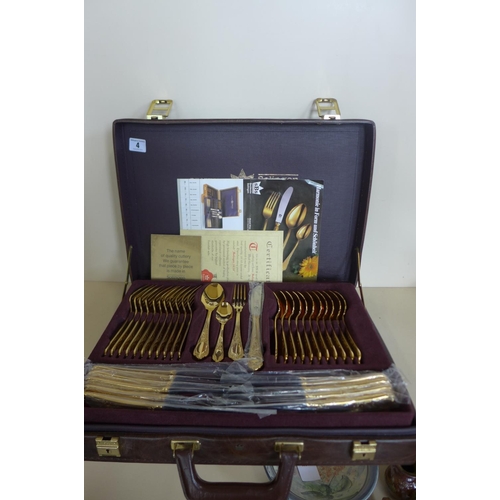 4 - A SBS Bestecke Solingen gold plated twelve setting canteen of cutlery in fitted case, in unused cond... 