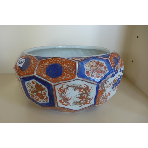 1245 - A large Imari faceted bowl, 19cm tall x 38cm wide, some wear to gilt but no obvious damage