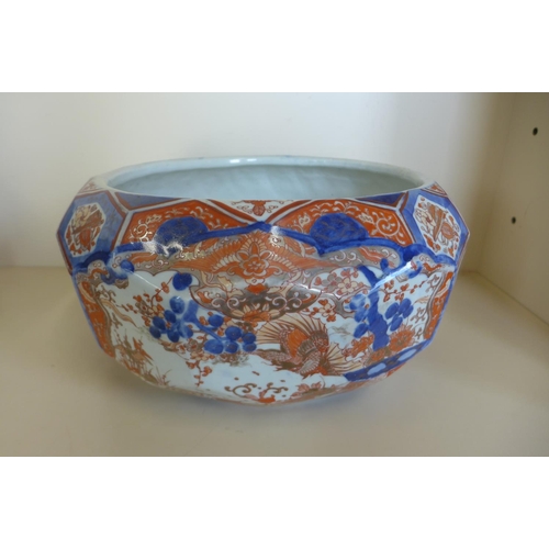 1245 - A large Imari faceted bowl, 19cm tall x 38cm wide, some wear to gilt but no obvious damage