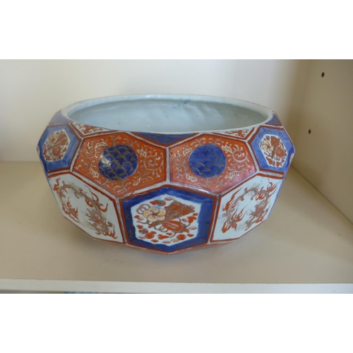 1245 - A large Imari faceted bowl, 19cm tall x 38cm wide, some wear to gilt but no obvious damage