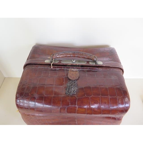 1240 - A late Victorian crocodile hide ladies vanity case, with silver and ivory fittings, 27cm tall x 37m ... 