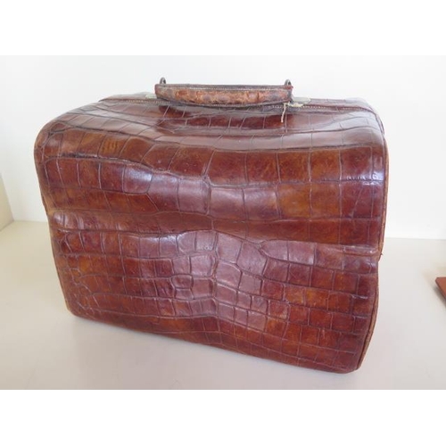 1240 - A late Victorian crocodile hide ladies vanity case, with silver and ivory fittings, 27cm tall x 37m ... 