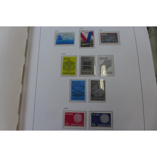 1369 - A comprehensive collection of Netherlands stamps from 1970-1990 housed in a Davo printed album - set... 