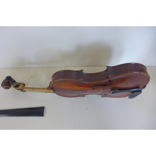 1263 - A violin with a one piece 14 1/4 inch,  36cm single piece back with a theador Berger 1923 label, Mak... 