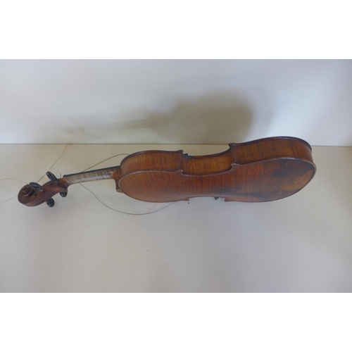 1264 - A violin with a 14 inch, 35.5cm one piece back and Antonius Stradivarius Cremoni label, in need of s... 