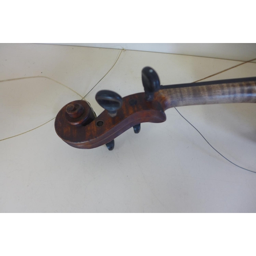 1264 - A violin with a 14 inch, 35.5cm one piece back and Antonius Stradivarius Cremoni label, in need of s... 