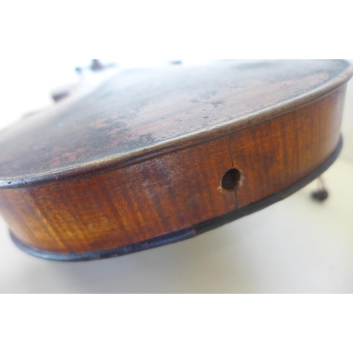 1264 - A violin with a 14 inch, 35.5cm one piece back and Antonius Stradivarius Cremoni label, in need of s... 