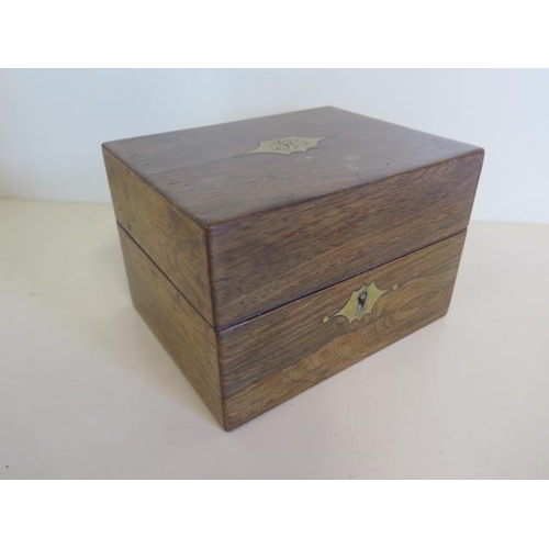 1232 - A 19th century mahogany travel box, with three bottles in a six section interior, missing three bott... 