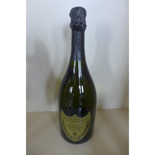 1258 - A bottle of Moet Chandon Dom Perignon 1999 Champagne, foil and label good