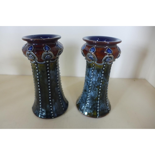 1261 - A pair of Royal Doulton vases, 13cm tall