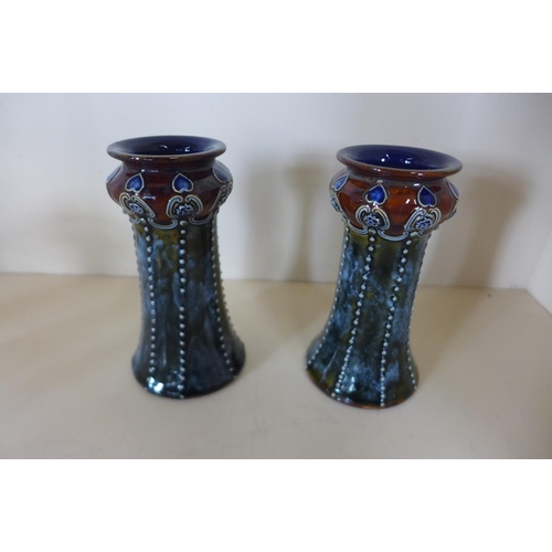 1261 - A pair of Royal Doulton vases, 13cm tall