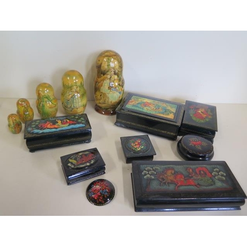 1269 - A good collection of seven hand painted Russian papier mache boxes, a brooch and a well painted Russ... 