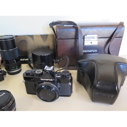 1278 - An Olympus OM1 camera Olympus OM 20 camera with 50mm Olympus lens, also an Olympus 28mm lens, Olympu... 