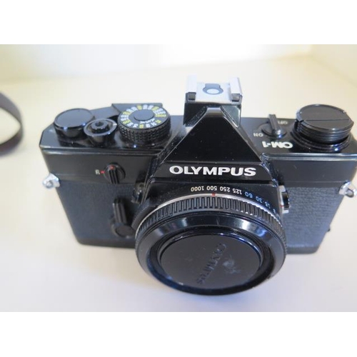 1278 - An Olympus OM1 camera Olympus OM 20 camera with 50mm Olympus lens, also an Olympus 28mm lens, Olympu... 