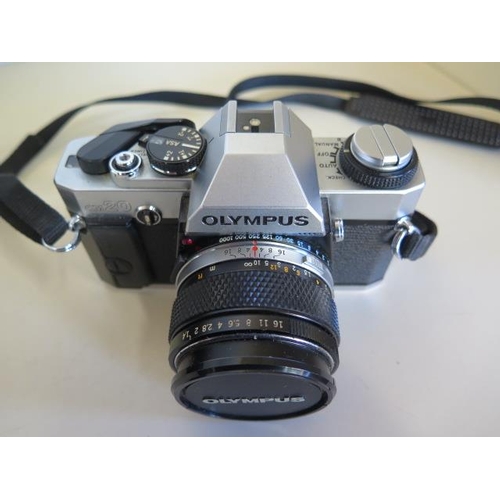 1278 - An Olympus OM1 camera Olympus OM 20 camera with 50mm Olympus lens, also an Olympus 28mm lens, Olympu... 