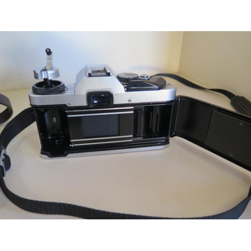 1278 - An Olympus OM1 camera Olympus OM 20 camera with 50mm Olympus lens, also an Olympus 28mm lens, Olympu... 