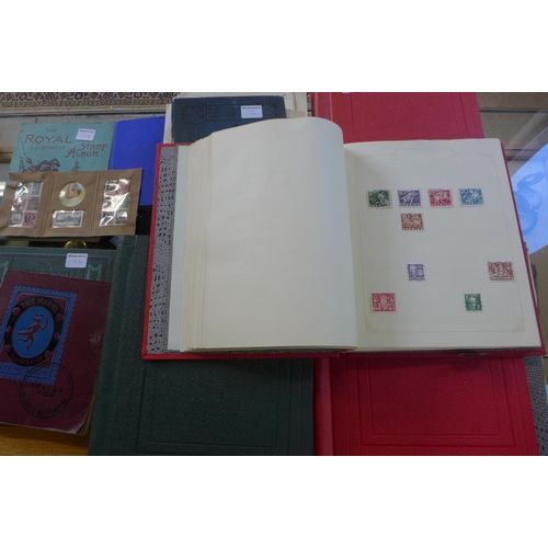 1356 - A collection of world stamps in nine albums together with loose sheets