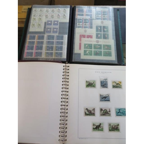 1360 - A collection of primarily mint hinged San Marino stamps, including in blocks of four, in a stock boo... 