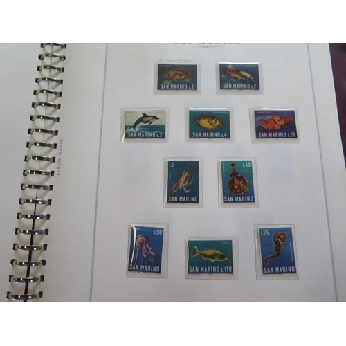 1360 - A collection of primarily mint hinged San Marino stamps, including in blocks of four, in a stock boo... 