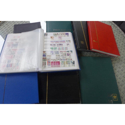 1362 - A wide ranging world stamp collection contained in nine stock books, and an FDC binder to include be... 