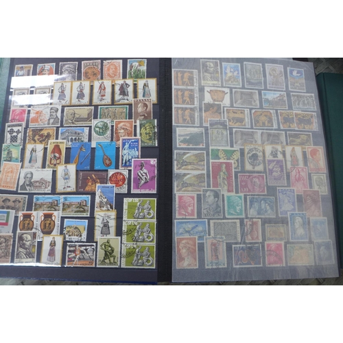 1362 - A wide ranging world stamp collection contained in nine stock books, and an FDC binder to include be... 