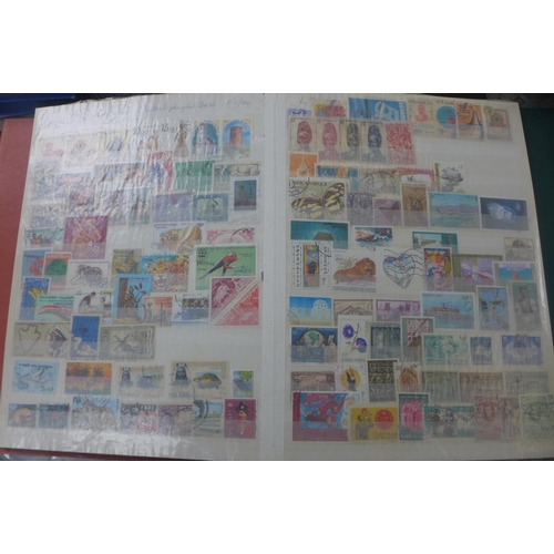 1362 - A wide ranging world stamp collection contained in nine stock books, and an FDC binder to include be... 