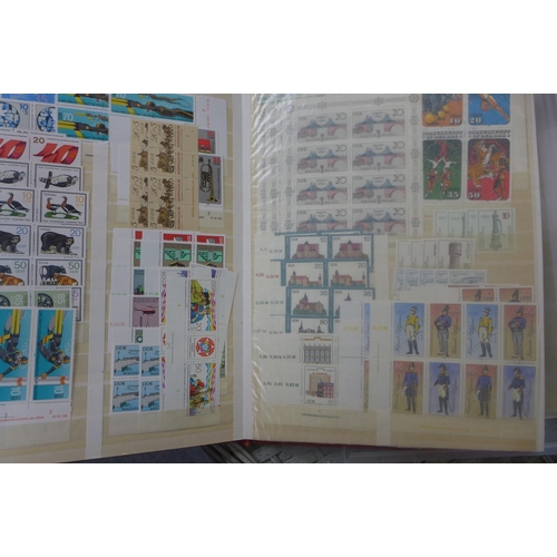 1362 - A wide ranging world stamp collection contained in nine stock books, and an FDC binder to include be... 