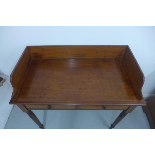 141 - An early Victorian mahogany washstand with two frieze drawers, in good polished condition, 90cm tall... 