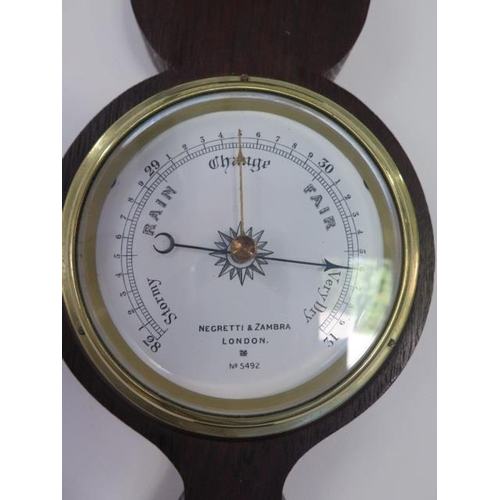 209 - A Victorian oak cased barometer with thermometer by Negratti and Zambra, London - height 61cm