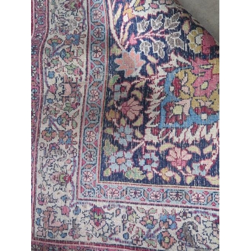 301 - An antique Persian carpet - removed from a Cambridge College, possibly early 20th century from North... 