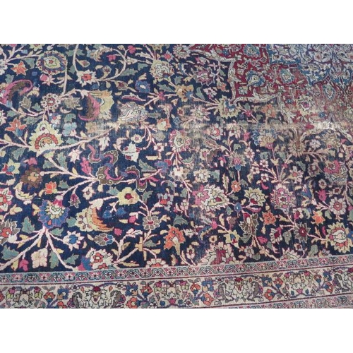 301 - An antique Persian carpet - removed from a Cambridge College, possibly early 20th century from North... 