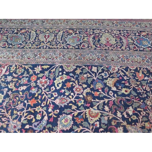 301 - An antique Persian carpet - removed from a Cambridge College, possibly early 20th century from North... 