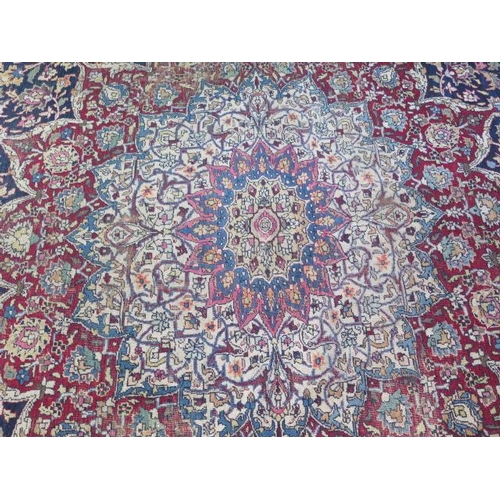 301 - An antique Persian carpet - removed from a Cambridge College, possibly early 20th century from North... 