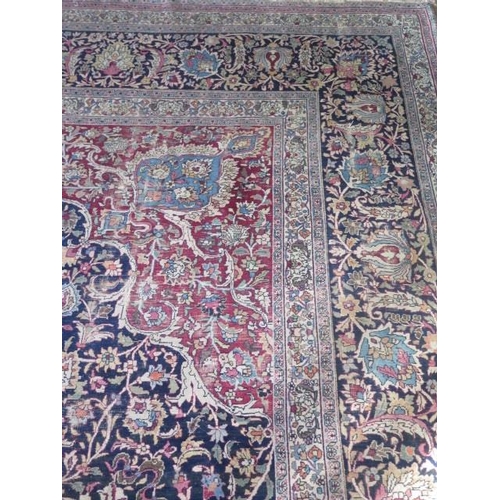 301 - An antique Persian carpet - removed from a Cambridge College, possibly early 20th century from North... 