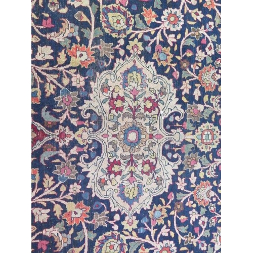 301 - An antique Persian carpet - removed from a Cambridge College, possibly early 20th century from North... 