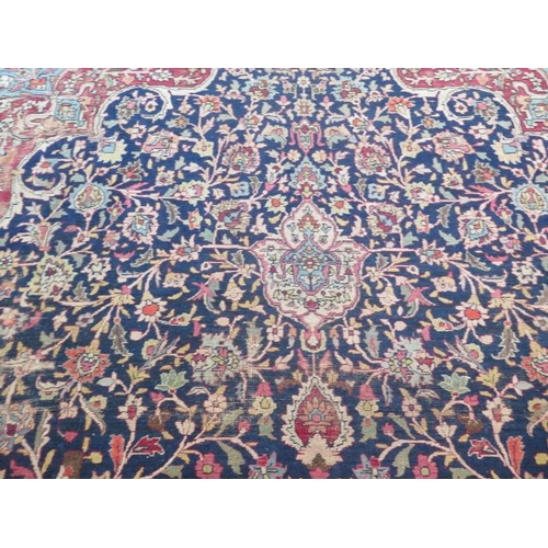 301 - An antique Persian carpet - removed from a Cambridge College, possibly early 20th century from North... 