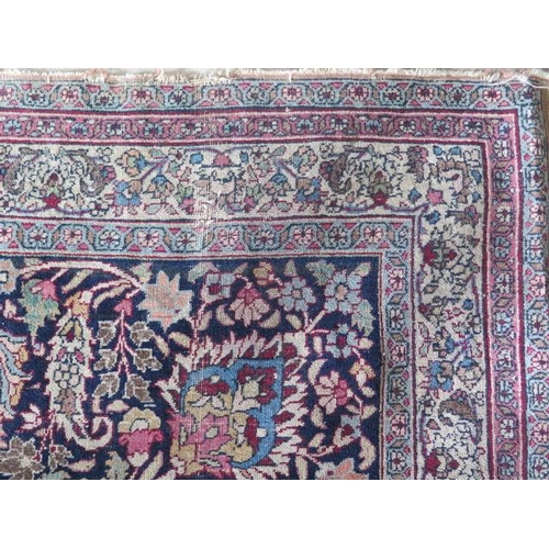 301 - An antique Persian carpet - removed from a Cambridge College, possibly early 20th century from North... 