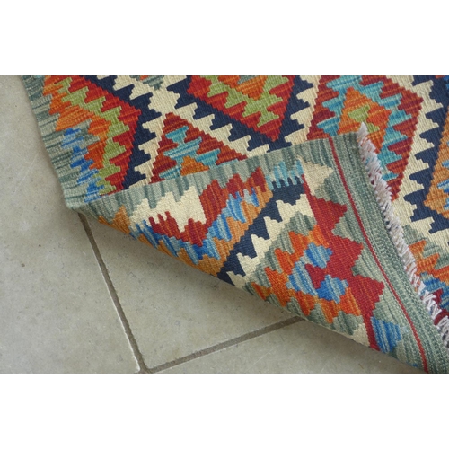 310 - A hand knotted vegetable dye wool Chobi Kelim runner, 193cm x 65cm