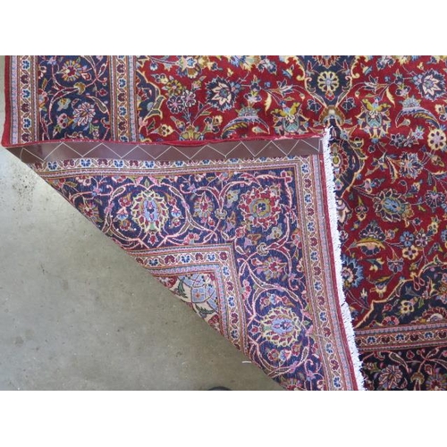 325 - A hand knotted woollen Persian rug, 228cmx 144cm