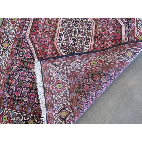 329 - A hand knotted woollen Zanjan rug, 172cm x 120cm