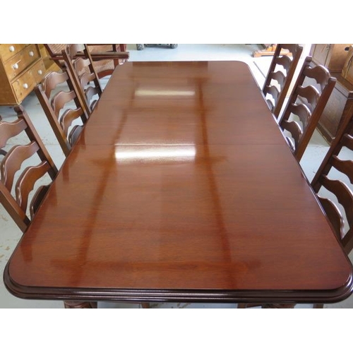 62 - A mahogany effect 19th century style pullout dining table with one leaf and six ladder back dining c... 