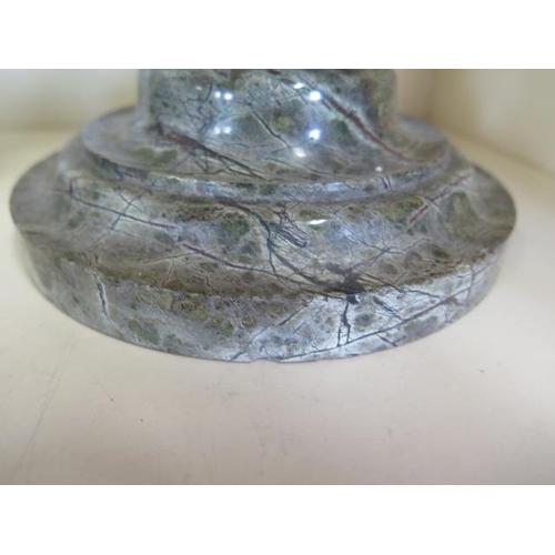 405 - A pair of Cornish serpentine marble candlesticks - 36cm tall, both have chipping, one broken and rep... 