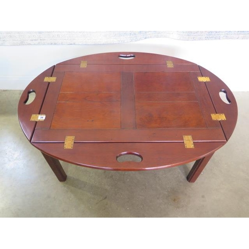 10 - A reproduction butlers tray on stand, converts to a coffee table, 47cm tall open x 110cm x 79cm