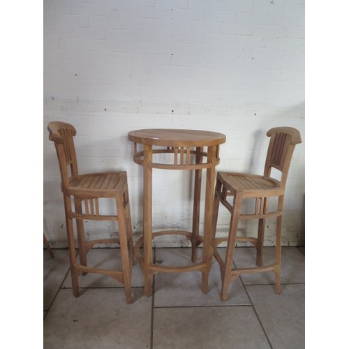4A - A new Oliver Heartwood Madagascar garden bar table 100cm x 60cm x 60cm and two Madagascar bar chairs... 